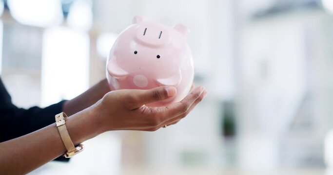 Empty piggy bank in hand due to inflation, poor economy and debt insurance with bokeh or on business background. Poverty, bankruptcy and woman entrepreneur struggling with financial loan or budget