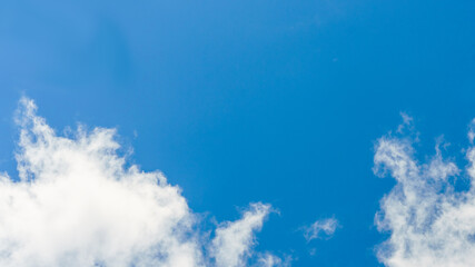 white clouds on blue blue sky on a summer day
