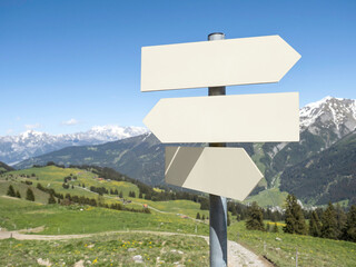 Three white arrows outdoors in nature. Mockup, blank board, concept, decision.