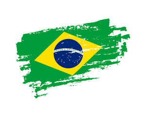 Hand painted Brazil grunge brush style flag on solid background