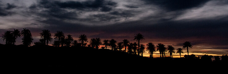 Obraz premium time lapse of clouds over the sunset