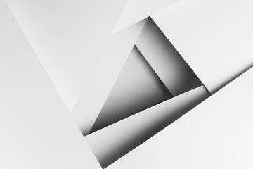 White abstract geometric background with crossing white flat surfaces, lines, angles, shadows and...