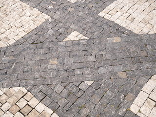 Granite paving stones on the square.