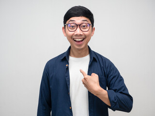 Young businessman wear glasses point finger at himself about choose me - obrazy, fototapety, plakaty