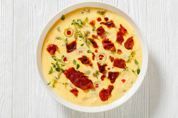 Beer cheese soup in bowl, top view