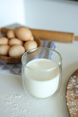 Baking ingredients placed on white table, ready for cooking. Concept of food preparation