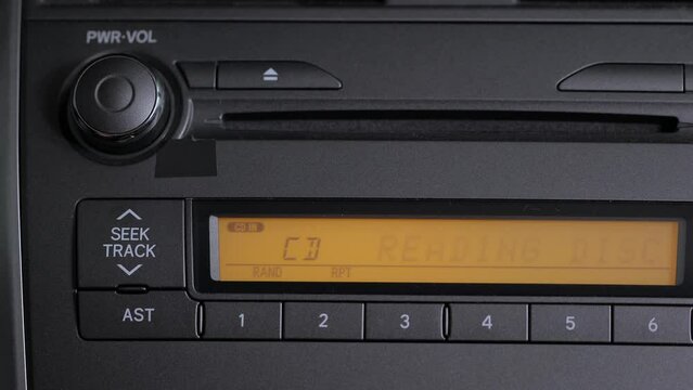Ejecting music CD in a car stereo