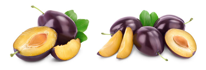 fresh purple plum and half with leaves isolated on white background with clipping path and full depth of field. Set or collection