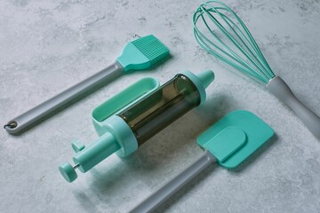 Closeup shot of a whisk and other baking tools