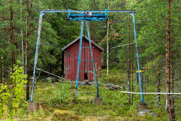 Burtrask, Sweden, An abadonned and ski lift in the forest.