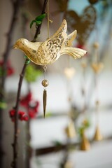 A souvenir made of clay on a chain. Handmade work.