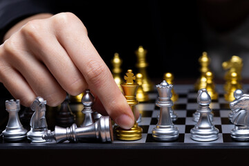 Business woman play Chess with close up Hand. Leader use strategy game to challenge competitor with intelligence leadership to move King to victory with management team idea fight, copy space