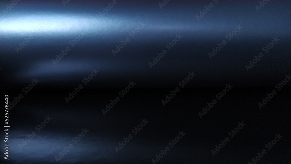 Poster gradient on a dark blue background. horizontally folded shiny paper or foil with overflow and highli
