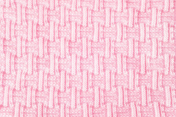 Texture of wool fabric in tender pink color. Abstact textile background. Top view.