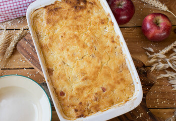 Millet casserole with grated apples and quark for breakfast