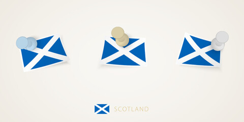 Pinned flag of Scotland in different shapes with twisted corners. Vector pushpins top view.