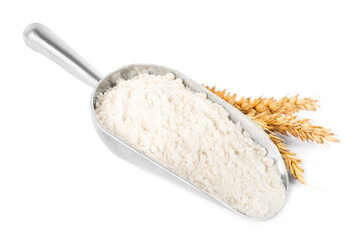 Scoop with wheat flour and spikes isolated on white