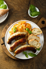 Traditional homemade sausages with sauerkraut ragout