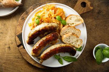 Traditional homemade sausages with sauerkraut ragout
