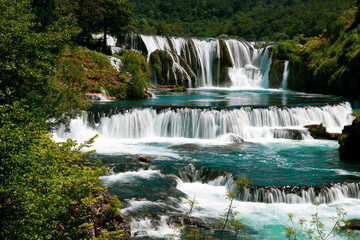 a magnificent waterfall called strbacki buk on the beautifully clean and drinking Una river in Bosnia and Herzegovina in the middle of a forest.