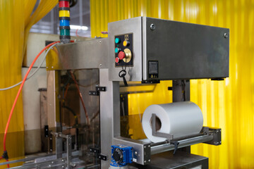Packaging machine in the industry factory. Manufacturing and industry concept