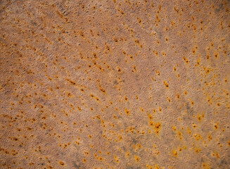 Rust surface. Close-up of rust on an old metal sheet. The texture of rust and oxidized metal. Old metal iron panel.