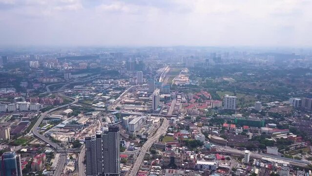 Drone shots of Kuala Lumpur skyline with skyscrapers, Malaysia, UHD