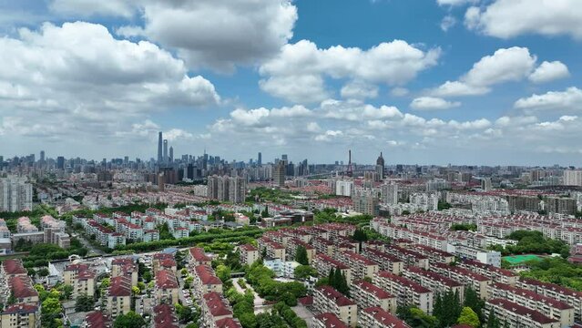 Cityscape and buildings in the downtown city. Drone aerial view. City skyline and rows of buildings in Shanghai China. Real estate development .  Business, economy, real estate concept b-roll footage.