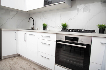 Fototapeta premium Modern electric oven in the kitchen. Interior and decorations in the kitchen. Kitchen making