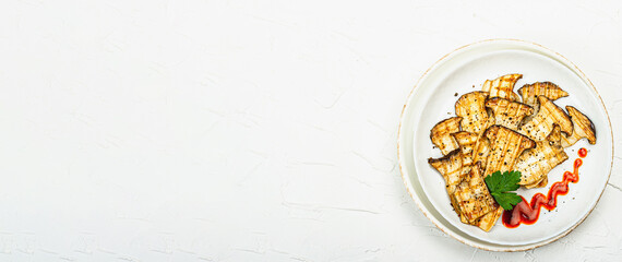 Fried slices Pleurotus eryngii mushrooms with sauce, spices and herbs. Healthy vegan food concept