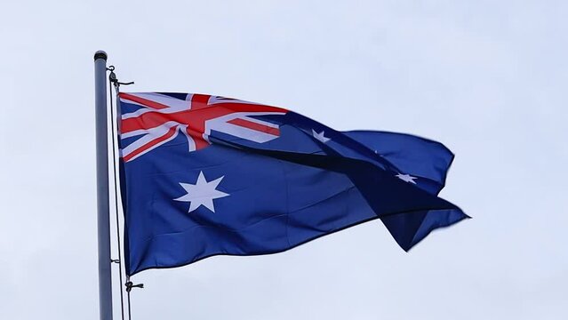 Australian flag is fluttering on top of the pole. Australia's independen
