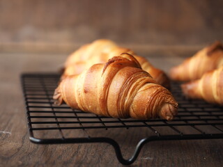 French butter croissants on baking rack