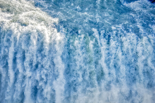 Wall of waterfall - Gullfoss waterfall in Iceland - close-up hdr photograph.