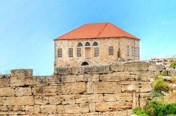 An abandoned traditional Lebanese house in Byblos, Lebanon. View of the colonial architecture with...
