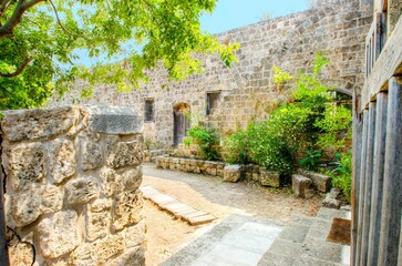 Obraz premium A part of the crusaders' castle in the ancient city of Byblos in Lebanon. A view of the exterior and the entrance leading into the main part of the dwelling.