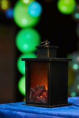 A bronze lantern for a candle. Interior decoration and decor