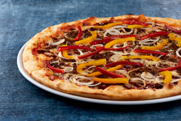 fresh pizza on the white plate