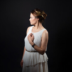 An ancient heroine, a young woman in the image of an ancient Greek goddess or muse. A noble heroine...