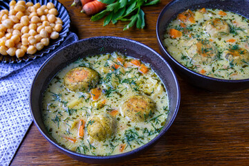 Vegetable and dill soup with chickpea meatballs