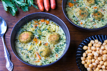 Vegetable and dill soup with chickpea meatballs