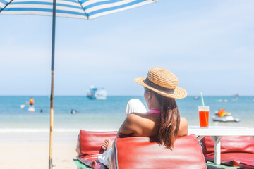 woman drinking juice on beach. vacation travel. Summer fun lifestyle