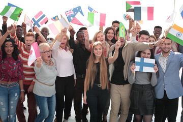 group of proud diverse people with their national flags