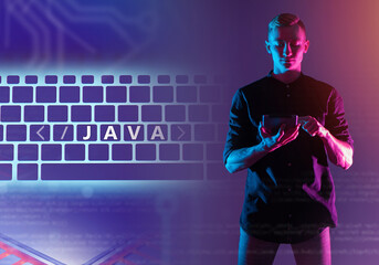Java programming. Java keys on keyboard. Programmer, coder with tablet. Using Javascript. Software...