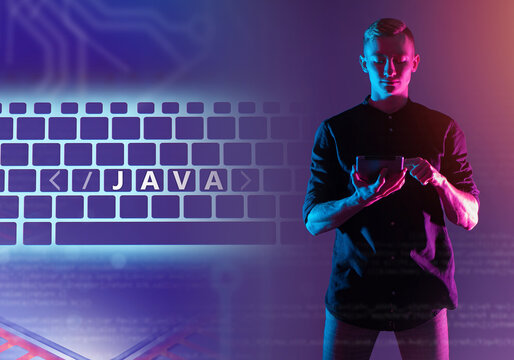 Java programming. Java keys on keyboard. Programmer, coder with tablet. Using Javascript. Software development. Creation of computer program or websites. Programming on Java. Programming language