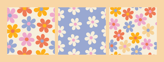 A set of floral patterns in the style of the 70s with groovy daisy flowers. Retro floral vector design. Style of the 60s, 70s, 80s