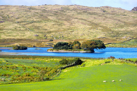 Lough Na Cranagh. Prehistoric crannog, a defensive man made island, in Lough of the Crannog on top of sea cliffs of Fair Head. Ballycastle, N. Ireland