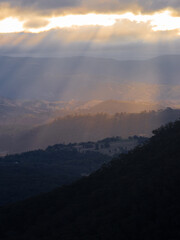 Beautiful light rays in the mountain valley.