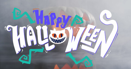 Happy halloween text banner against smoke effect over pumpkin against grey background