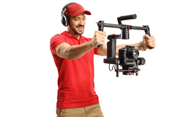 Camera operator recording with a camera gimbal stabilizer