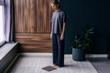 Woman doing yoga practice at home